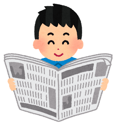 新聞を読む男性